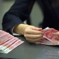 적극적으로 인민폐 국제 영향력 개척해야